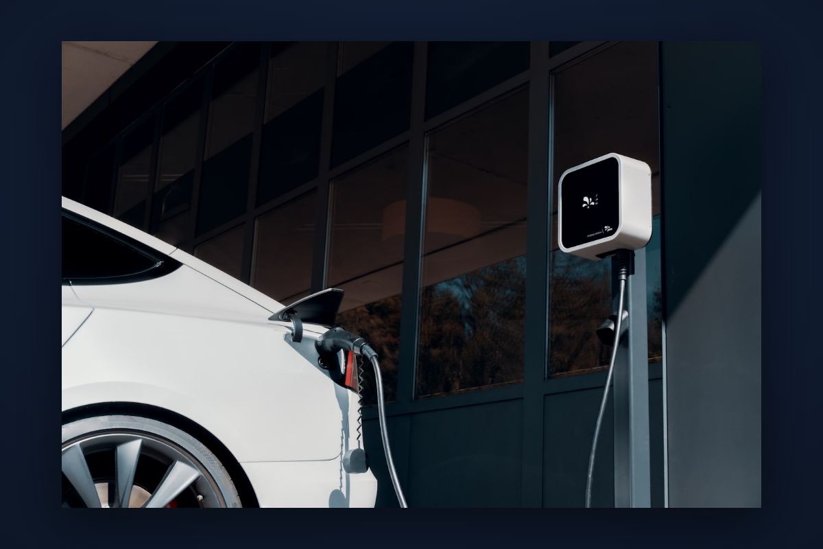 Tesla charging at a home wall charger