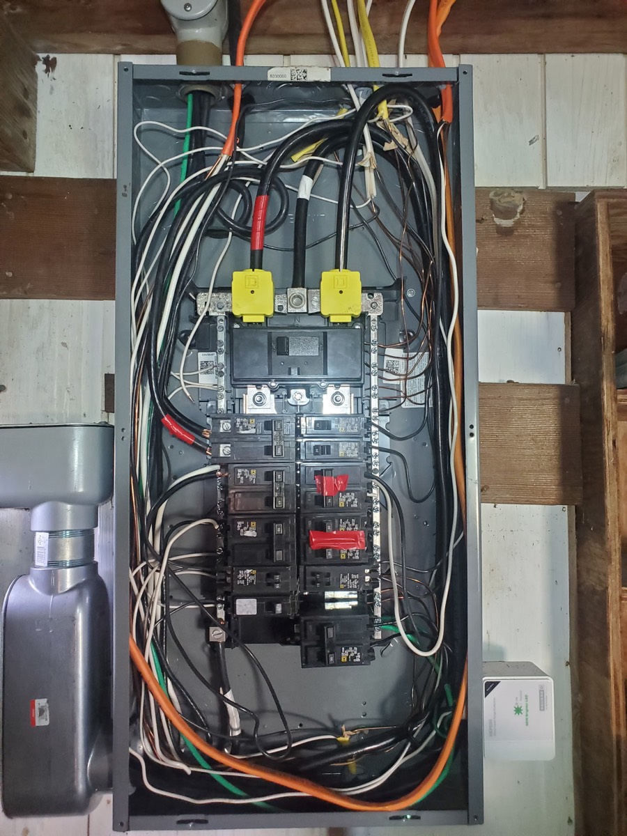 Existing electrical panel before the service upgrade