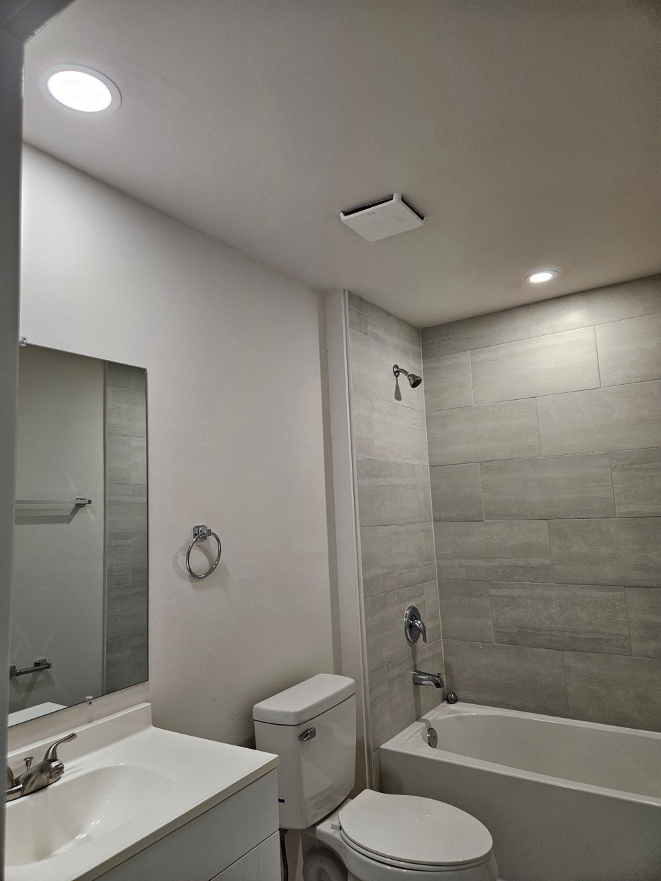 Recessed lighting and exhaust fan in a finished bathroom