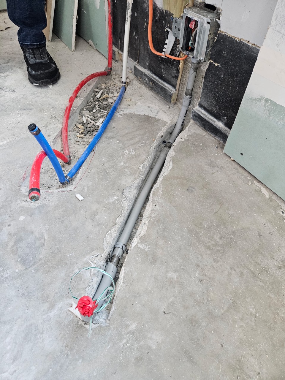 Conduit and circuits traced and re-run through a concrete slab